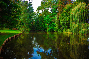 Fototapeta na wymiar Beautiful small park and water canal in Lubeck, Germany