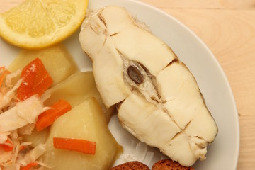 Белая рыба под лимонным соком с сухарями