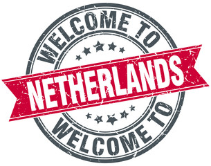 welcome to Netherlands red round vintage stamp