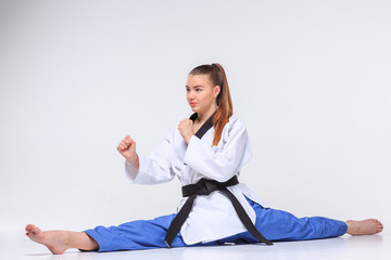 The karate girl with black belt 