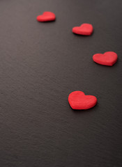 Obraz premium Hearts on stone board