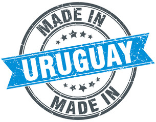 made in Uruguay blue round vintage stamp