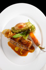 Baked lamb with bacon and vegetable