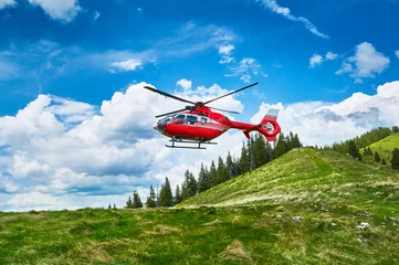 Wall murals Helicopter Helicopter takeoff in the mountains