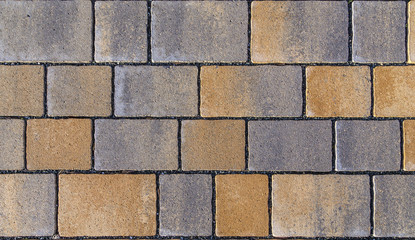 Paving blocks made of square stone in bright ligh