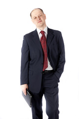 Portrait of a businessman with a tablet computer against a white background