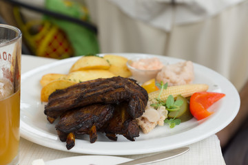 portion of meat with salad