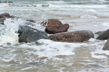 stones in a raging sea