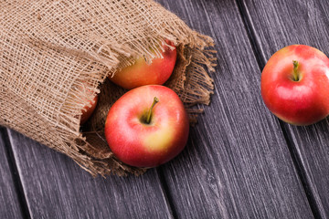 Whole apples scattered on table