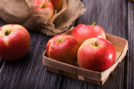 Apples in basket and burlap