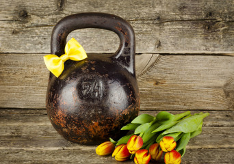Old kettlebell with a bow