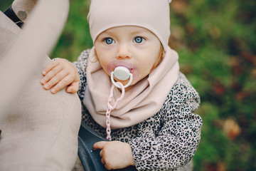 young family walking in the park