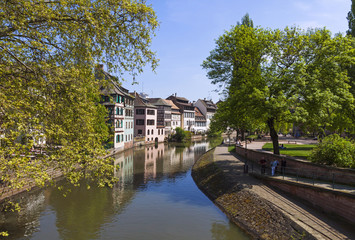 Fototapeta na wymiar Water canal in Petite France area in Strasbourg city, France