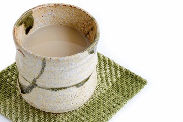 Traditional Japanese Rice Drink on White Background