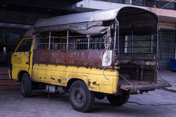 An old part of a car with nearly broken. Rust is all around the component and some can be use as...