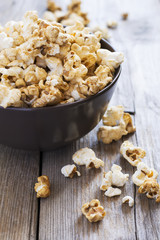 Sweet caramel popcorn in a  bowl, selective focus