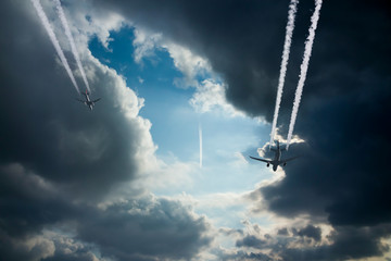 More than one airplanes and contrail