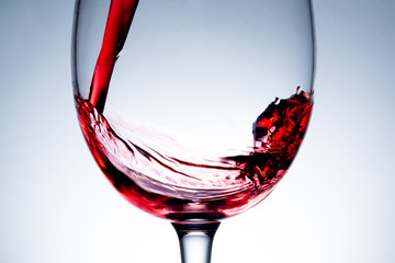 stream of wine being poured into a glass,  wine, splashing, splash, 
