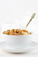 Oatmeal flakes with nuts in bowl