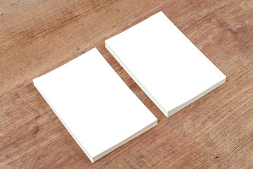 Blank paper with empty space mock up on wood background