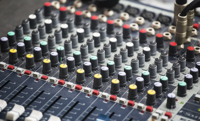 Sound console with colorful equalizer levels dials