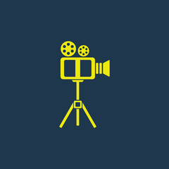 Obraz premium Yellow icon of Video Camera on dark blue background. Eps.10
