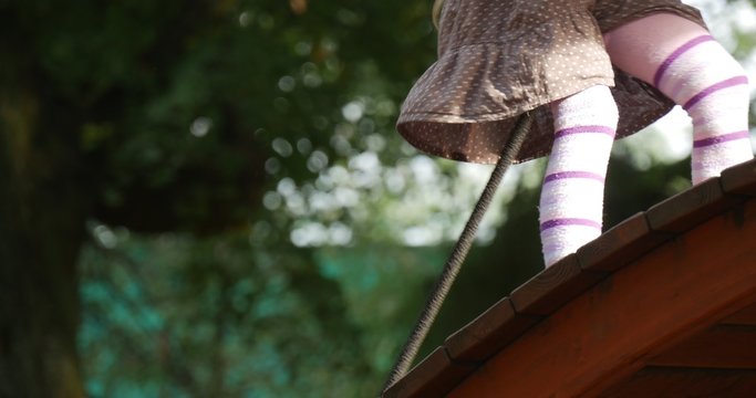 Girl Long Fair Hairs is Climbing b on The Chute Holding on the Rope Smiling Going Down Little Girl Long Hairs Ponytails Lilac Bows T-Shirt Children