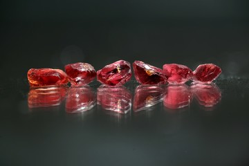 Uncut and raw Garnet crystals. These natural rough gems have been traditionally handpanned from...