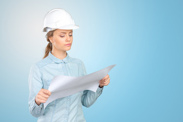 Woman construction worker with hard hat