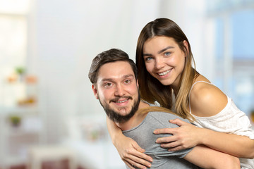 Fototapeta premium Cheerful young couple standing
