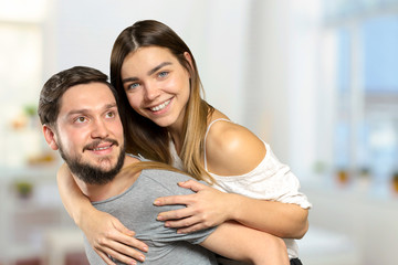 Cheerful young couple standing