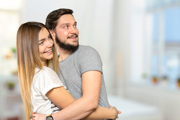 Fototapeta premium Cheerful young couple standing