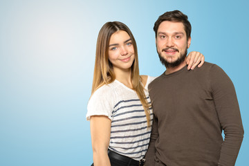 Fototapeta premium Cheerful young couple standing