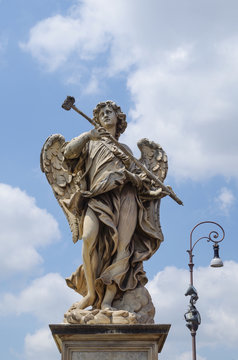 marble statue of angel from the Sant'Angelo Bridge in Rome, Italy