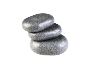 Stack of spa hot stones isolated on white background