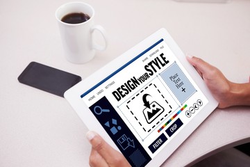 Composite image of woman using tablet pc 