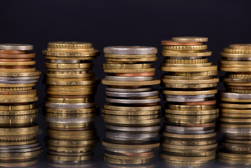 Stack Coins Over Black Background