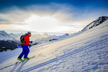 Foto op Canvas Ski tour - skier climbing to the top   © Gorilla
