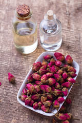 Bottles with essential aroma oil with  rose