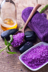 Spa setting. Lavender sea salt, bottle with aroma oil and towels