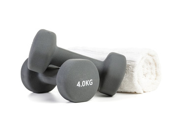 Dumbbells and towel isolated on white background