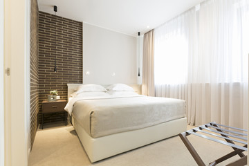 Fototapeta na wymiar Modern bedroom interior in the morning