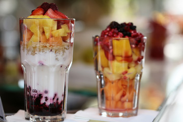 Two glassed with fruit salads