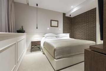 Modern bedroom interior in the evening