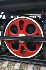 red wheels of an old steam locomotive