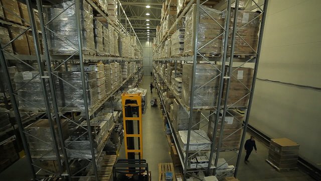 Modern large warehouse and loader