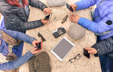 Young people texting and playing with telephone 