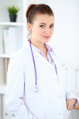 Portrait of young female  doctor in a hospital