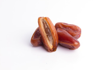 Dried dates fruit on white background