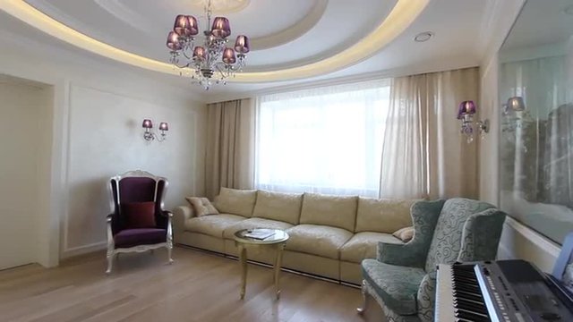 Day room with TV, karaoke, sofas and piano. View showcase of modern elegant luxury apartment interior design decoration of area living rooms in stylish contemporary feel house. Home furnishings.